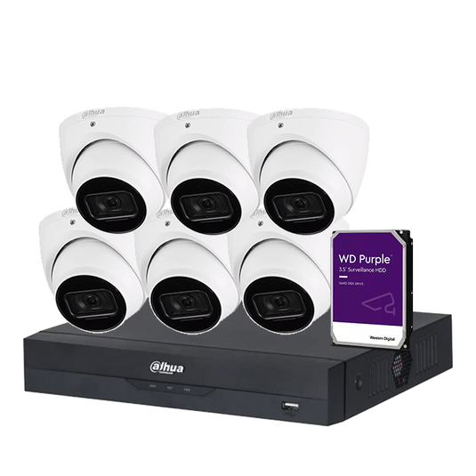 Set of security cameras with a hard drive on a white background